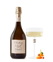 Load image into Gallery viewer, Prima Pave - Grand Cuvee Second Edition - Non-Alcoholic Sparkling Wine with glass and fruit
